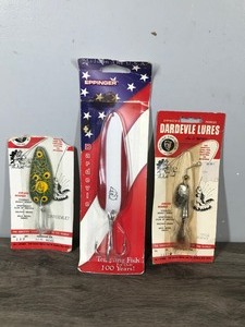 lot 196 image: Lot of 3 Collectible Eppinger Daredevle Fishing Lures in Original Packages