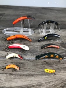 lot 443 image: Lot of 10 Collectible Fishing Lures - most of them are Lazy Ikes - see description for more info