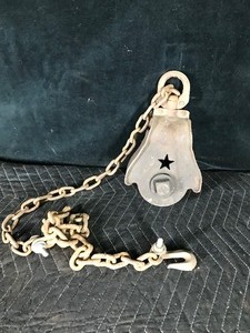 lot 97 image: Vintage Cast Iron Star Pulley with Chain