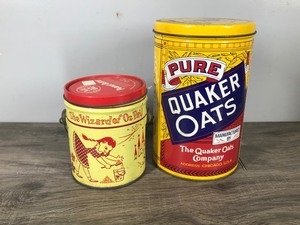 lot 94 image: Collectible Tins - Pure Quaker Oats and Swift OZ Peanut Butter