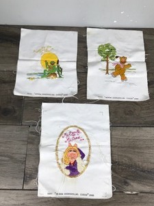 lot 168 image: 3 - 1980 Caron Jim Hensons Muppet Collection Fozzie Bear (#6442), Kermit the Frog(#6440) and Miss Piggy(#6441) Crewel Pictures