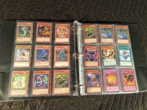 lot 129 image: Binder of 97 Yu-Gi-Oh trading cards