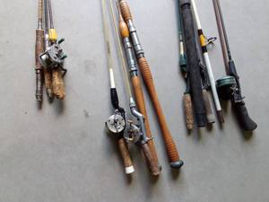 lot 74 image: 3 steel, 2 bamboo and  7 other fishing rods and 4 fishing reels