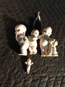 lot 75 image: 4 ceramic cupid dolls