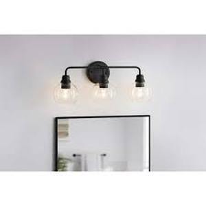 lot 52 image: Hampton Bay Florabelle 24 in. W 3-Light Vanity Light Antique Gold Clear Globe Glass Shades Customer Returns See Pictures