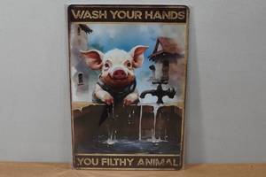 lot 212 image: Novelty Metal Sign - Filthy Animal