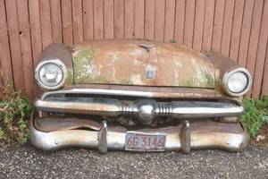 lot 15 image: Vintage 1950s Ford Car Front End