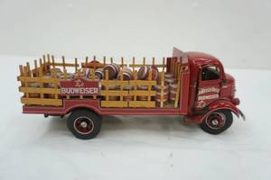 lot 64 image: Danbury Mint 1938 Budweiser Beer GMC Stake Bed Delivery Truck