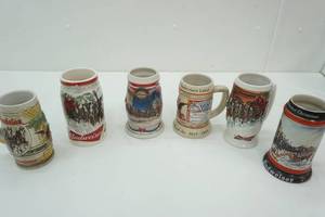 lot 71 image: Budweiser Clydesdale Holiday Steins 5ct & 1ct Evolution of the Budweiser Label 1999 State Convention Stein