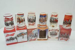 lot 75 image: Budweiser Holiday Steins 6ct