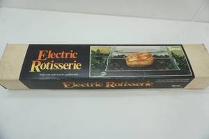 lot 133 image: Electric Rotisserie. New never used. 1982