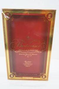 lot 136 image: Budweiser Millenium Limited Edition 1 qt Bottle & 4 Glasses. 1999
