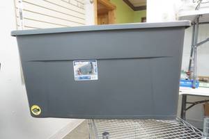 lot 283 image: Sterilite 45 GAL tote on wheels with lid