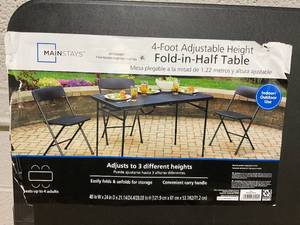 lot 106 image: Mainstays 4 Foot Fold-in-Half Adjustable Folding Table