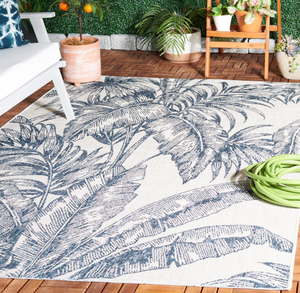 lot 486 image: SAFAVIEH Courtyard Collection Area Rug - 67 Square, Ivory & Navy, Geometric Pattern, IndoorOutdoor & Washable, Ideal for Patio, Backyard, Mudroom