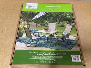lot 482 image: Mainstays 26LB Matte Black Round Umbrella Base Designed to be Used with a Patio Table