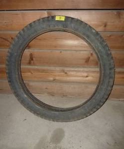 lot 9 image: VintageAntique Wards car tire 30x3