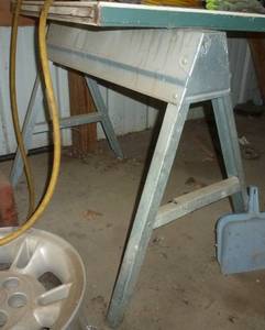 lot 313 image: Two metal sawhorses