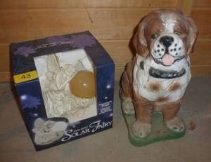 lot 43 image: a very heavy concrete dog statue and solar fairy