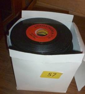 lot 57 image: Box full of 45 rpm records must be close to 100