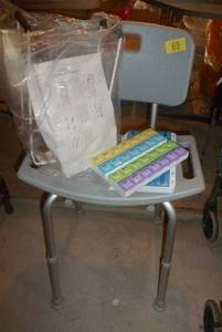 lot 69 image: Shower chair, pill boxes, device to help put socks on