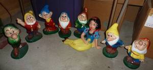 lot 72 image: Snow White and the Seven Dwarfs concrete yard ornaments