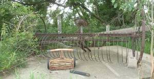 lot 106 image: Old HayBuck Rake and push reel mower