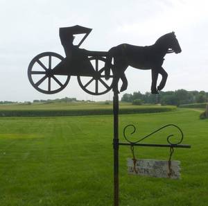 lot 108 image: Double sided horse and buggy metal sign
