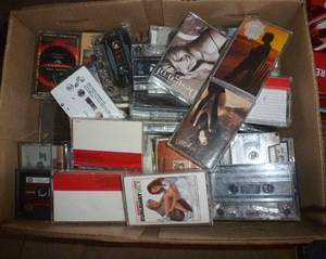 lot 123 image: Box full of probably 60 cassettes