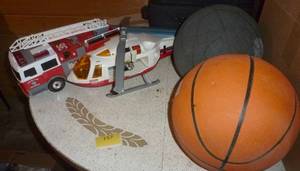 lot 157 image: Firetruck, Tonka helicopter and basketballs