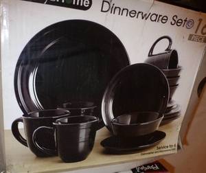 lot 171 image: 2 New black dinnerware sets each has 4 dinner plates, 4 cups, 4 bowls, 4 small plates