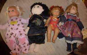 lot 195 image: 4 DOLLS - the pink one talks