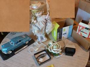 lot 226 image: Tucker die cast car, doll, night light, infuser, slide viewer