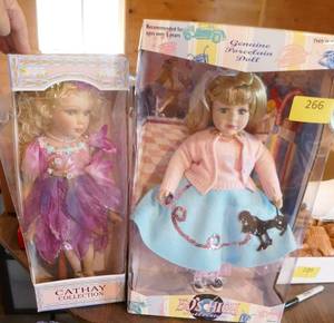 lot 266 image: Two new dolls