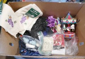 lot 268 image: Box of misc - towels, carousel, outlets, candle, dcor, led butterfly, coffee cup, curtains