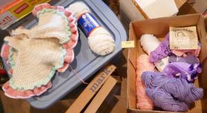 lot 269 image: Box of yarn and knitted doll dress etc