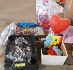 lot 272 image: New wireless headphones, New Lego racers, plush bear, train wall hangings, thomas train, doll clothes and a heart light