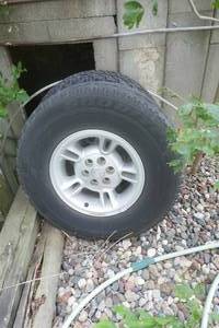 lot 309 image: two tires and 3 rims off dodge ram