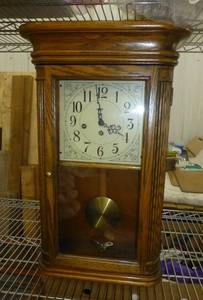 lot 304 image: Howard Miller Wind up Oak WallShelf Clock with Oak Yorkshire Finish