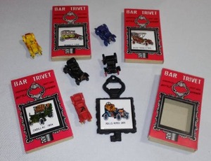 lot 508 image: Cast Bar Trivet Bottle Opener (4) And Mini Cast Roadsters (4).