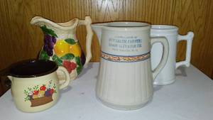 lot 582 image: New Salem Farmers Union Elevator Pitcher  Plus (3) More.