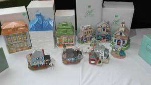 lot 590 image: Avon Collectible Village Pieces (8)