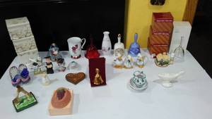 lot 688 image: Avon Collectible Figurines And More.