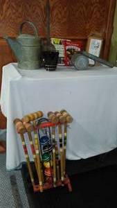 lot 704 image: Better Homes Garden Book, Galvanized Water Can, Plant Duster And More.