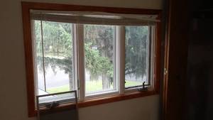 lot 742 image: Cabin Teardown Casement Window, Closet Door And Baseboard Heater (3).   Includes All Trim And Molding In Room.