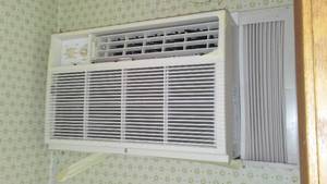 lot 747 image: Cabin Teardown Wall Shelving, Ac, Wards Water Heater.