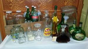 lot 709 image: Assorted Vintage Collectible Bottles.