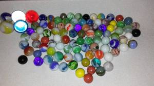 lot 725 image: Vintage Glass Marbles And Shooters