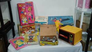 lot 731 image: Mini Mix It, Microwave, Melody Train, Paper Dolls, Tippy Toes Bike (2)
