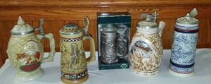 lot 800 image: Avon Collectible Steins (4)